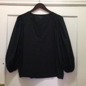 Black full sleeve blouse.